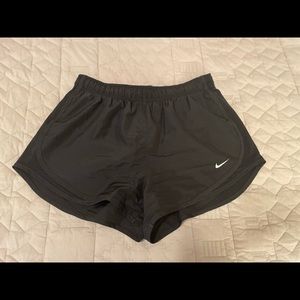 Size M solid black Nike shorts